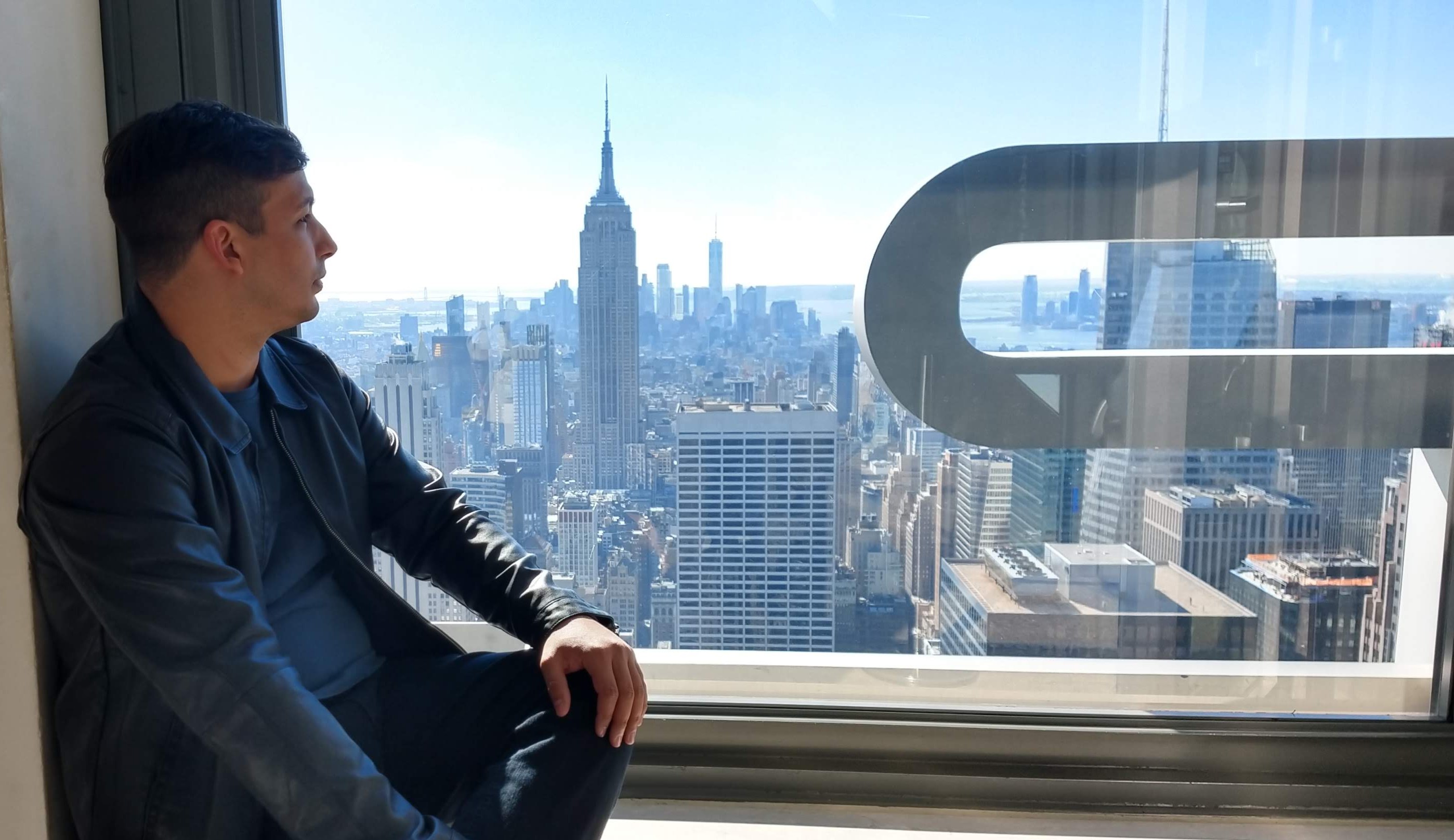Anderson overlooking the Manhattan skyline